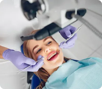 Female patient undergoing a dental procedure