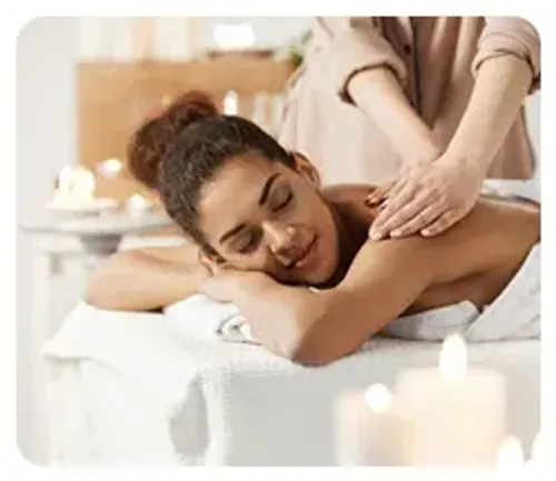 Woman receiving a luxury spa massage therapy for relaxation anda wellness