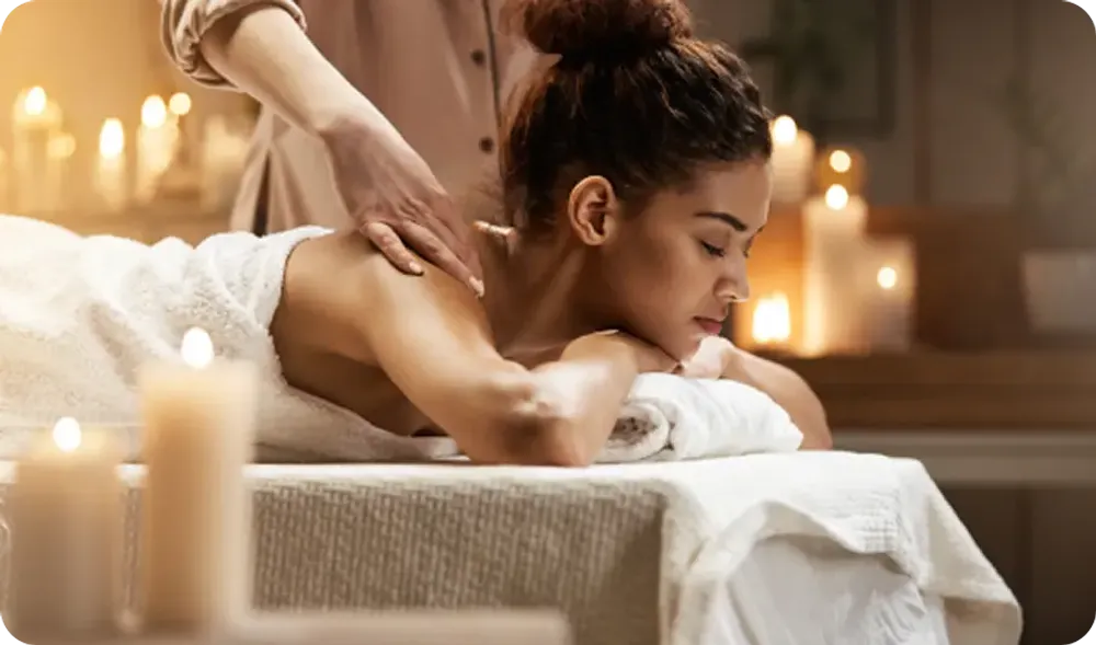 A women enjoying a relaxing massage at a spa